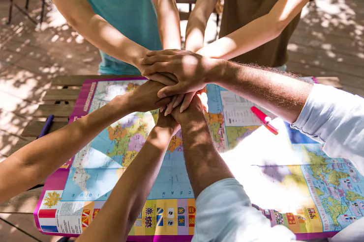 Cropped picture young multiethnic friends team